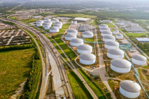 Aerial view of oil refinery nearby highway in Houston, Texas, USA.